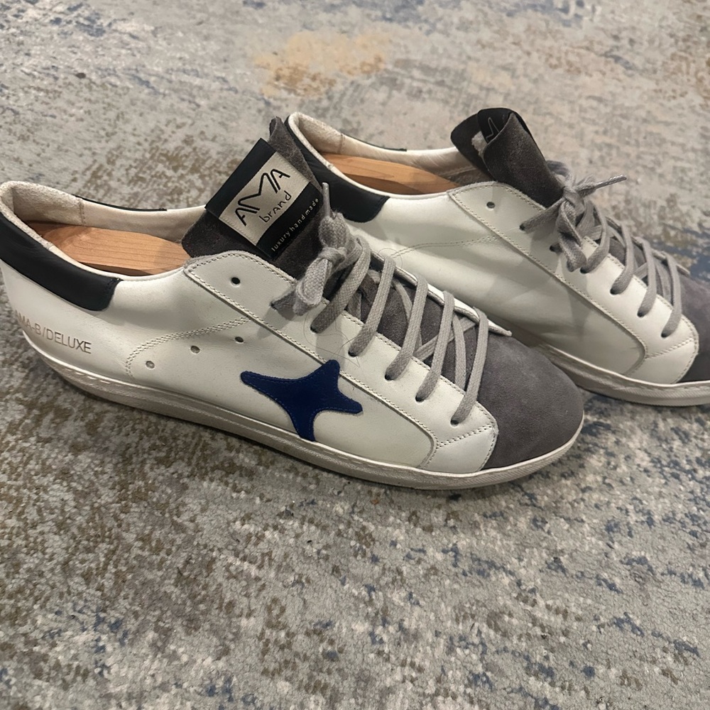 White and Gray Sneakers with Blue Accent